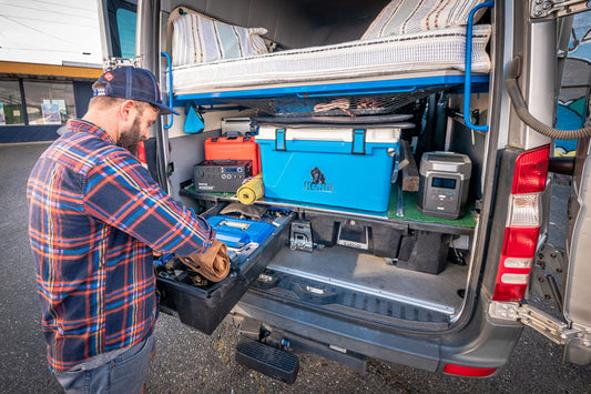 Man using DECKED custom van shelving